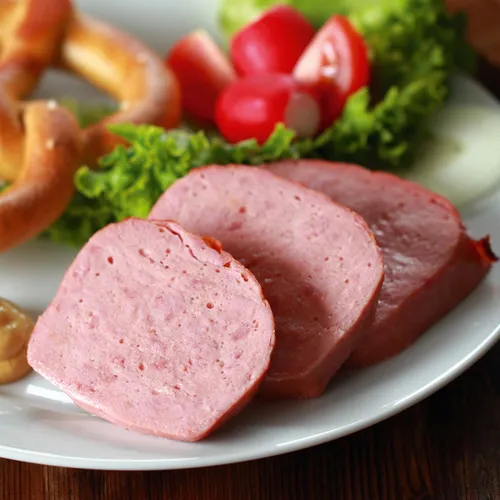 Kümmelkraut mit gebackenem Leberkäse